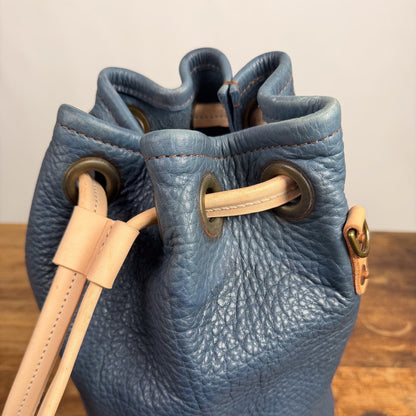 LEATHER BUCKET BAG - MEDIUM - SMOKEY BLUE - NATURAL STRAPS - WATER DAMAGE IN SHIPMENT - NEARLY PERFECT - IN STOCK