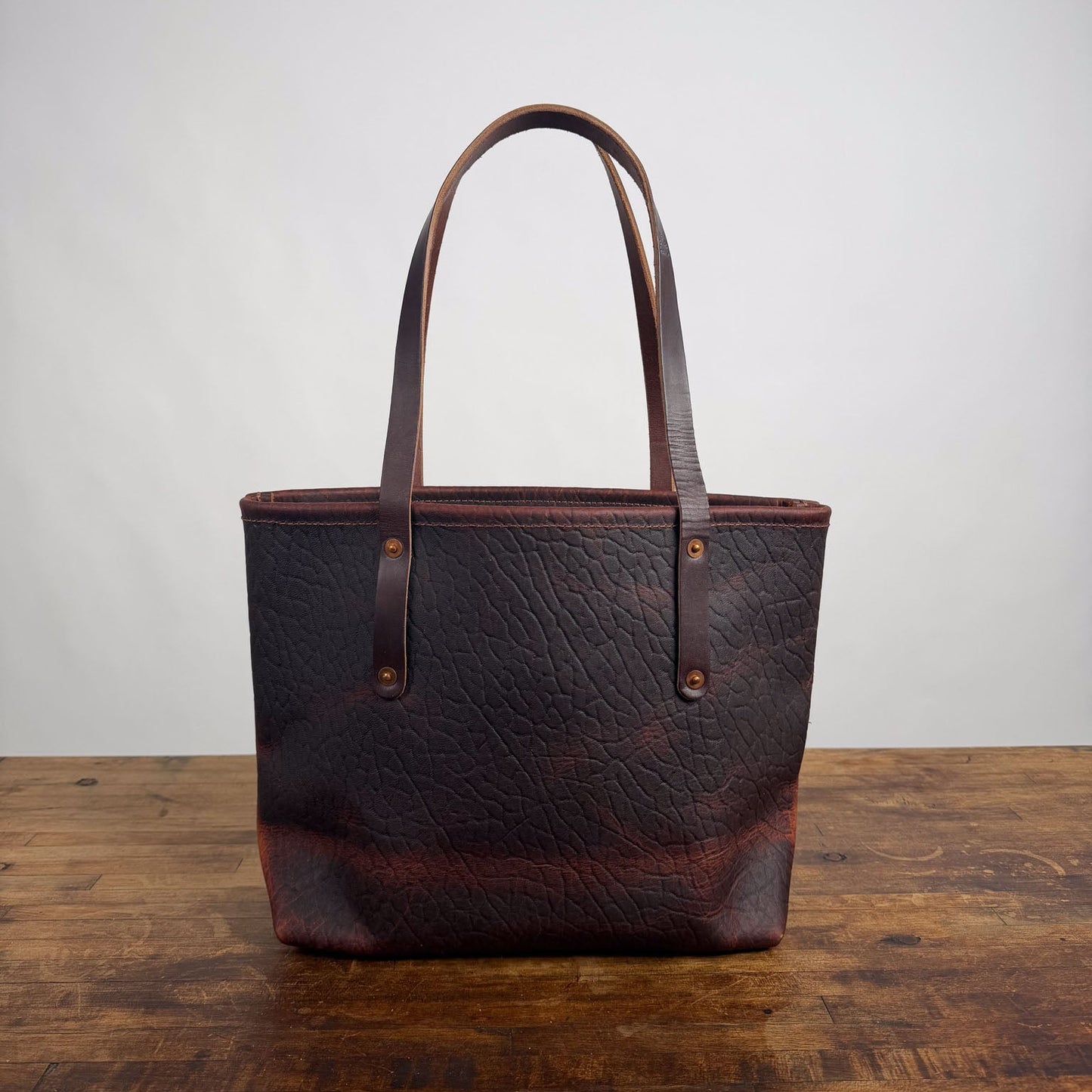 AVERY LEATHER TOTE BAG - MEDIUM - CHERRY BISON - ZIPPER - SMALL FRONT POCKET - BRASS FEET - NEARLY PERFECT - IN STOCK